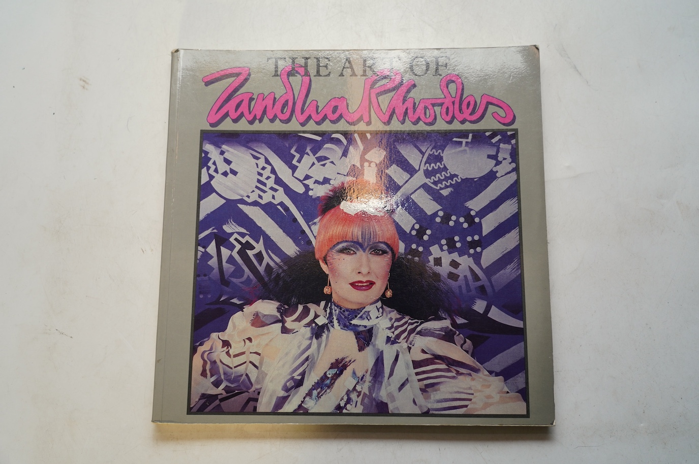 A Zandra Rhodes handbag and The Art of Zandra Rhodes signed book